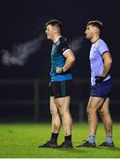 30 November 2022; Donal Conlon of Maynooth University, left, and Malachy Stone of UCD during the Electric Ireland Higher Education Senior Football Division 1 League Final match between UCD and Maynooth University at the Dublin City University Sports Campus in Dublin. Photo by Tyler Miller/Sportsfile