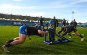 2 December 2022; Leinster Rugby supporter Jack Skelly and his family were guests of Leinster at their captain's run today, pictured is Jack Skelly on the scrum machine with Tadhg Furlong, left, and Cian Healy during a Leinster Rugby captain's run at the RDS Arena in Dublin. Photo by Harry Murphy/Sportsfile