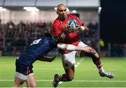 2 December 2022; Simon Zebo of Munster is tackled by James Lang of Edinburgh during the United Rugby Championship match between Edinburgh and Munster at the Dam Heath Stadium in Edinburgh, Scotland. Photo by Paul Devlin/Sportsfile