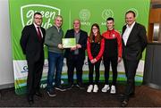 3 December 2022; Nick Roberts, third from left, Nicole Roberts and Darragh Roberts second from right, all from Kildavin Clonegal GAA, Carlow, are presented with a phase one club recognition plaque by Department of the Environment, Climate and Communications Executive Officer Robert Mooney, far left, Chair of the GAA Green Club Steering Committee Padraig Fallon, second from left, and Dublin City Council Executive Manager Liam Bergin, far right, during the GAA Green Club Toolkit Launch at Croke Park in Dublin. Photo by Sam Barnes/Sportsfile
