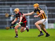 3 December 2022; Peter Hogan of Ballygunner is tackled by Gary Brennan of Ballyea during the AIB Munster GAA Hurling Senior Club Championship Final match between Ballygunner of Waterford and Ballyea of Clare at FBD Semple Stadium in Thurles, Tipperary. Photo by Ray McManus/Sportsfile