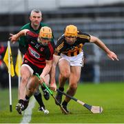 3 December 2022; Peter Hogan of Ballygunner is tackled by Gary Brennan of Ballyea during the AIB Munster GAA Hurling Senior Club Championship Final match between Ballygunner of Waterford and Ballyea of Clare at FBD Semple Stadium in Thurles, Tipperary. Photo by Ray McManus/Sportsfile