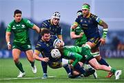 3 December 2022; Michele Lamaro of Benetton is tackled by Mack Hansen of Connacht during the United Rugby Championship match between Connacht and Benetton at The Sportsground in Galway. Photo by Ben McShane/Sportsfile