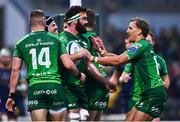 3 December 2022; Paul Boyle of Connacht, centre, celebrates with teammates, including John Porch, right, and Diarmuid Kilgallen, 14, during the United Rugby Championship match between Connacht and Benetton at The Sportsground in Galway. Photo by Ben McShane/Sportsfile