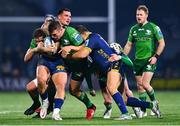 3 December 2022; Tom Farrell of Connacht is tackled by Marco Zanon, left, and Giacomo Nicotera of Benetton during the United Rugby Championship match between Connacht and Benetton at The Sportsground in Galway. Photo by Ben McShane/Sportsfile