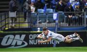 3 December 2022; Ethan McIlroy of Ulster dives over to score his side's third try during the United Rugby Championship match between Leinster and Ulster at the RDS Arena in Dublin. Photo by Ramsey Cardy/Sportsfile