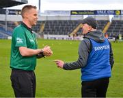 3 December 2022; Ballyea manager Robbie Hogan in conversation with match referee Michael Kennedy before the AIB Munster GAA Hurling Senior Club Championship Final match between Ballygunner of Waterford and Ballyea of Clare at FBD Semple Stadium in Thurles, Tipperary. Photo by Ray McManus/Sportsfile
