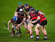 3 December 2022; Paddy Leavey of Ballygunner supported by team mates  Ian Kenny, Tadhg Foley and Philip Mahony, 6, is tackled by Pearse Lillis and Aaron Griffin, green helmet, of Ballyea during the AIB Munster GAA Hurling Senior Club Championship Final match between Ballygunner of Waterford and Ballyea of Clare at FBD Semple Stadium in Thurles, Tipperary. Photo by Ray McManus/Sportsfile