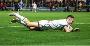3 December 2022; Ethan McIlroy of Ulster dives over to score his side's third try during the United Rugby Championship match between Leinster and Ulster at the RDS Arena in Dublin. Photo by John Dickson/Sportsfile