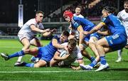 3 December 2022; Stuart McCloskey of Ulster is tackled by Ross Byrne, Josh van der Flier and Jack Conans of Leinster during the United Rugby Championship match between Leinster and Ulster at the RDS Arena in Dublin. Photo by John Dickson/Sportsfile