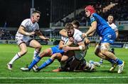 3 December 2022; Stuart McCloskey of Ulster is tackled by Ross Byrne, Josh van der Flier and Jack Conans of Leinster during the United Rugby Championship match between Leinster and Ulster at the RDS Arena in Dublin. Photo by John Dickson/Sportsfile