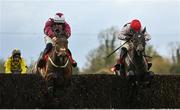 4 December 2022; Malina Girl, right, with Luke Dempsey up, jumps the last on their way to winning the Bar One Racing Irish EBF Mares Handicap Steeplechase, from second place Optional Mix, left, with Jordan Gainford up, at Fairyhouse Racecourse in Ratoath, Meath. Photo by Seb Daly/Sportsfile