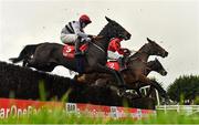 4 December 2022; Malina Girl, 5, with Luke Dempsey up, jumps the last during the first circuit on their way to winning the Bar One Racing Irish EBF Mares Handicap Steeplechase at Fairyhouse Racecourse in Ratoath, Meath. Photo by Seb Daly/Sportsfile