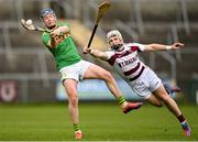 4 December 2022; Keelan Molloy of Dunloy Cuchullains in action against Cormac O'Doherty of Slaughtneil during the AIB Ulster GAA Hurling Senior Club Championship Final match between Dunloy Cuchullains of Antrim and Slaughtneil of Derry at Athletics Grounds in Armagh. Photo by Ramsey Cardy/Sportsfile