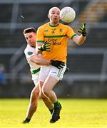 4 December 2022; Barry Walsh of Tourlestrane in action against Dessie Conneely of Moycullen during the AIB Connacht GAA Football Senior Club Championship Final match between Moycullen of Galway and Tourlestrane of Mayo at Pearse Stadium in Galway. Photo by Ben McShane/Sportsfile