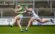 4 December 2022; Eamon Smyth of Dunloy Cuchullains in action against Shane McGuigan of Slaughtneil during the AIB Ulster GAA Hurling Senior Club Championship Final match between Dunloy Cuchullains of Antrim and Slaughtneil of Derry at Athletics Grounds in Armagh. Photo by Ramsey Cardy/Sportsfile