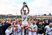 4 December 2022; Moycullen captain Dessie Conneely lifts The Shane McGettigan Cup with his teammates after the AIB Connacht GAA Football Senior Club Championship Final match between Moycullen of Galway and Tourlestrane of Mayo at Pearse Stadium in Galway. Photo by Ben McShane/Sportsfile