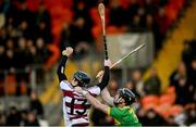 4 December 2022; Brendan Rogers of Slaughtneil in action against Ryan McGarry of Dunloy Cuchullains during the AIB Ulster GAA Hurling Senior Club Championship Final match between Dunloy Cuchullains of Antrim and Slaughtneil of Derry at Athletics Grounds in Armagh. Photo by Ramsey Cardy/Sportsfile
