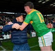 4 December 2022; Dunloy Cuchullains manager Gregory O'Kane, left, celebrates with Keelan Molloy after the AIB Ulster GAA Hurling Senior Club Championship Final match between Dunloy Cuchullains of Antrim and Slaughtneil of Derry at Athletics Grounds in Armagh. Photo by Ramsey Cardy/Sportsfile