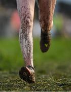 4 December 2022; A detailed view of mud on the legs on an athlete competing during the 123.ie Novice & Uneven Age Cross Country Championships at St Catherines AC in Cork. Photo by Eóin Noonan/Sportsfile