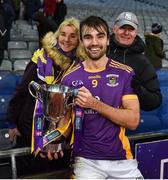 4 December 2022; Ben Shovlin of Kilmacud Crokes celebrates with his parents Karen and John after the AIB Leinster GAA Football Senior Club Championship Final match between Kilmacud Crokes of Dublin and The Downs of Westmeath at Croke Park in Dublin. Photo by Daire Brennan/Sportsfile