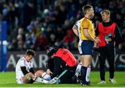 3 December 2022; Billy Burns of Ulster is treated for an injury during the United Rugby Championship match between Leinster and Ulster at the RDS Arena in Dublin. Photo by Ramsey Cardy/Sportsfile