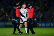 3 December 2022; John Cooney of Ulster leaves the pitch with an injury during the United Rugby Championship match between Leinster and Ulster at the RDS Arena in Dublin. Photo by Ramsey Cardy/Sportsfile