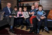 5 December 2022; Uachtarán Chumann Lúthchleas Gael Larry McCarthy, left, with Joe, age 12, Eve, age 8, and Patrick McNamara, age 10, from Harold's Cross, Dublin, and Sportsfile photographer Ray McManus, and his grandchildren Luka, age 2, and Rian age 5, from Harold's Cross Dublin, at the launch of A Season of Sundays 2022 at The Croke Park Hotel in Dublin. Photo by Seb Daly/Sportsfile