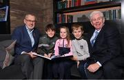 5 December 2022; Uachtarán Chumann Lúthchleas Gael Larry McCarthy, left, with Joe, age 12, Eve, age 8, and Patrick McNamara, age 10, from Harold's Cross, Dublin, and Sportsfile photographer Ray McManus, at the launch of A Season of Sundays 2022 at The Croke Park Hotel in Dublin. Photo by Seb Daly/Sportsfile