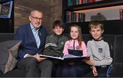 5 December 2022; Uachtarán Chumann Lúthchleas Gael Larry McCarthy, left, with Joe, age 12, Eve, age 8, and Patrick McNamara, age 10, from Harold's Cross, Dublin, at the launch of A Season of Sundays 2022 at The Croke Park Hotel in Dublin. Photo by Seb Daly/Sportsfile