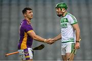 4 December 2022; Darragh Butler of Kilmacud Crokes shakes hands with Eoin Cody of Shamrocks Ballyhale after the AIB Leinster GAA Hurling Senior Club Championship Final match between Kilmacud Crokes of Dublin and Shamrocks Ballyhale of Kilkenny at Croke Park in Dublin. Photo by Piaras Ó Mídheach/Sportsfile