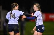 7 December 2022; Caoimhe McCormack of Midlands, right, is congratulated by teammate Ellie O’Sullivan Sexton after scoring their side's third try during the Bank of Ireland Leinster Rugby Sarah Robinson Cup Round 3 match between Metro and Midlands at Coolmine RFC in Dublin. Photo by Seb Daly/Sportsfile