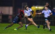 7 December 2022; Sorcha Ryan of Midlands is tackled by Teniola Omogbode of Metro during the Bank of Ireland Leinster Rugby Sarah Robinson Cup Round 3 match between Metro and Midlands at Coolmine RFC in Dublin. Photo by Seb Daly/Sportsfile