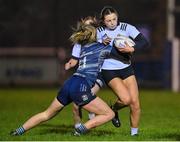 7 December 2022; Jodi Ahern of Midlands is tackled by Sadhbh Furlong of Metro during the Bank of Ireland Leinster Rugby Sarah Robinson Cup Round 3 match between Metro and Midlands at Coolmine RFC in Dublin. Photo by Seb Daly/Sportsfile