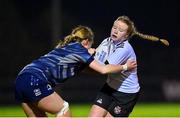 7 December 2022; Aoife Hughes of Midlands is tackled by Mia Gordon of Metro during the Bank of Ireland Leinster Rugby Sarah Robinson Cup Round 3 match between Metro and Midlands at Coolmine RFC in Dublin. Photo by Seb Daly/Sportsfile