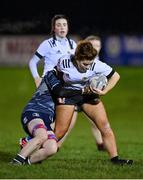 7 December 2022; Hannah Kennedy of Midlands is tackled by Sarah Moody of Metro during the Bank of Ireland Leinster Rugby Sarah Robinson Cup Round 3 match between Metro and Midlands at Coolmine RFC in Dublin. Photo by Seb Daly/Sportsfile