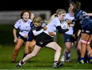 7 December 2022; Aoibhe Kelly of Midlands is tackled by Giselle O’Donoghue of Metro during the Bank of Ireland Leinster Rugby Sarah Robinson Cup Round 3 match between Metro and Midlands at Coolmine RFC in Dublin. Photo by Seb Daly/Sportsfile