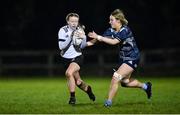7 December 2022; Aoife Hughes of Midlands in action against Mia Gordon of Metro during the Bank of Ireland Leinster Rugby Sarah Robinson Cup Round 3 match between Metro and Midlands at Coolmine RFC in Dublin. Photo by Seb Daly/Sportsfile