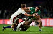 12 March 2022; James Lowe of Ireland is tackled by Max Malins and Courtney Lawes of England during the Guinness Six Nations Rugby Championship match between England and Ireland at Twickenham Stadium in London, England. Photo by Brendan Moran/Sportsfile