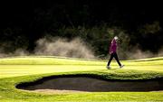 23 September 2022; Leona Maguire of Ireland walks from the 15th green as steam fog rises off the river Rine during round two of the KPMG Women's Irish Open Golf Championship at Dromoland Castle in Clare. Photo by Brendan Moran/Sportsfile