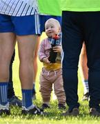 17 September 2022; Fíadh, age 2, offers her father Dean Healy of St Patrick's a water bottle after their side's victory in the Wicklow Senior Club Football Championship Semi-Final match between Arklow Geraldines Ballymoney and St Patrick's at County Grounds in Aughrim, Wicklow. Photo by Piaras Ó Mídheach/Sportsfile