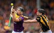 21 May 2022; Conor McDonald of Wexford in action against Conor Delaney of Kilkenny during the Leinster GAA Hurling Senior Championship Round 5 match between Kilkenny and Wexford at UPMC Nowlan Park in Kilkenny. Photo by Stephen McCarthy/Sportsfile