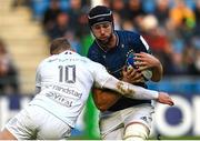 10 December 2022; Caelan Doris of Leinster is tackled by Finn Russell of Racing 92 during the Heineken Champions Cup Pool A Round 1 match between Racing 92 and Leinster at Stade Océane in Le Havre, France. Photo by Harry Murphy/Sportsfile