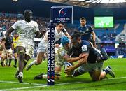 10 December 2022; James Lowe of Leinster is tackled into touch by Maxime Baudonne of Racing 92 during the Heineken Champions Cup Pool A Round 1 match between Racing 92 and Leinster at Stade Océane in Le Havre, France. Photo by Harry Murphy/Sportsfile