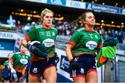 10 December 2022; Michaela Kenneally, left, and Grainne Horan of Mullinahone makes their way on to the pitch before the 2022 currentaccount.ie LGFA All-Ireland Intermediate Club Football Championship Final match between Longford Slashers of Longford and Mullinahone of Tipperary at Croke Park in Dublin. Photo by Ben McShane/Sportsfile