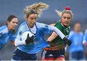 10 December 2022; Orla Nevin of Longford Slashers in action against Aoibhe O'Shea of Mullinahone during the 2022 currentaccount.ie LGFA All-Ireland Intermediate Club Football Championship Final match between Longford Slashers of Longford and Mullinahone of Tipperary at Croke Park in Dublin. Photo by Ben McShane/Sportsfile