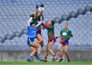 10 December 2022; Michaela Kenneally, centre, and Lauren Dowling, right, of Mullinahone battle for possession with Clare Farrell of Longford Slashers during the 2022 currentaccount.ie LGFA All-Ireland Intermediate Club Football Championship Final match between Longford Slashers of Longford and Mullinahone of Tipperary at Croke Park in Dublin. Photo by Tyler Miller/Sportsfile