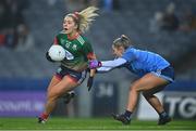 10 December 2022; Aoibhe O'Shea of Mullinahone in action against Grace Kenny of Longford Slashers during the 2022 currentaccount.ie LGFA All-Ireland Intermediate Club Football Championship Final match between Longford Slashers of Longford and Mullinahone of Tipperary at Croke Park in Dublin. Photo by Ben McShane/Sportsfile
