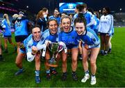 10 December 2022; Longford Slashers players, from left, Clare Farrell, Emily Reilly, Laura Kenny and Grace Kenny celebrate with the cup after the 2022 currentaccount.ie LGFA All-Ireland Intermediate Club Football Championship Final match between Longford Slashers of Longford and Mullinahone of Tipperary at Croke Park in Dublin.