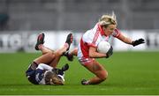 10 December 2022; Eimear Traynor of Donaghmoyne Lynsey is tripped by Noone of Kilkerrin-Clonberne during the 2022 currentaccount.ie LGFA All-Ireland Senior Club Football Championship Final match between Donaghmoyne of Monaghan, and Kilkerrin-Clonberne of Galway at Croke Park in Dublin. Photo by Tyler Miller/Sportsfile